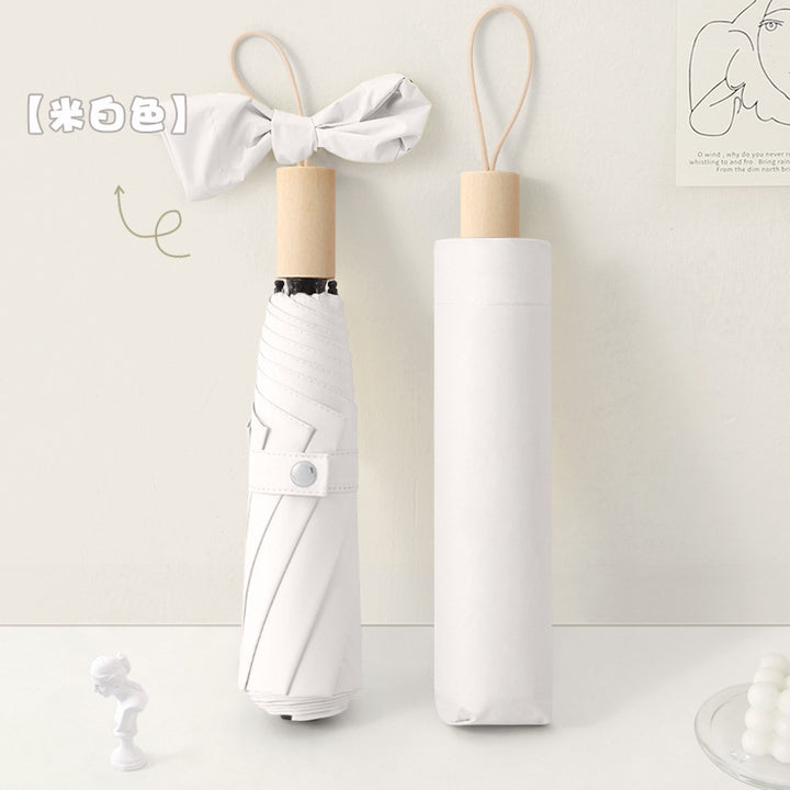Dame elegant klappparaply med innovativ design Skanto