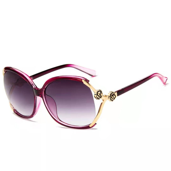 Dame elegante oversized solbrille med gyldne aksenter Skanto