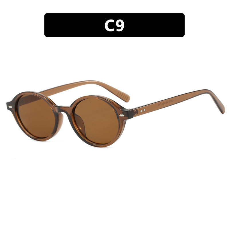 Dame rund solbrille med moderne design og polariserte glass Skanto
