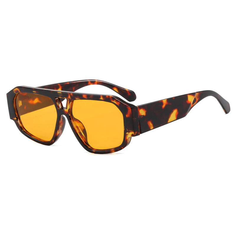 Dame solbrille med iøynefallende oktagon-design og UV-beskyttelse Skanto