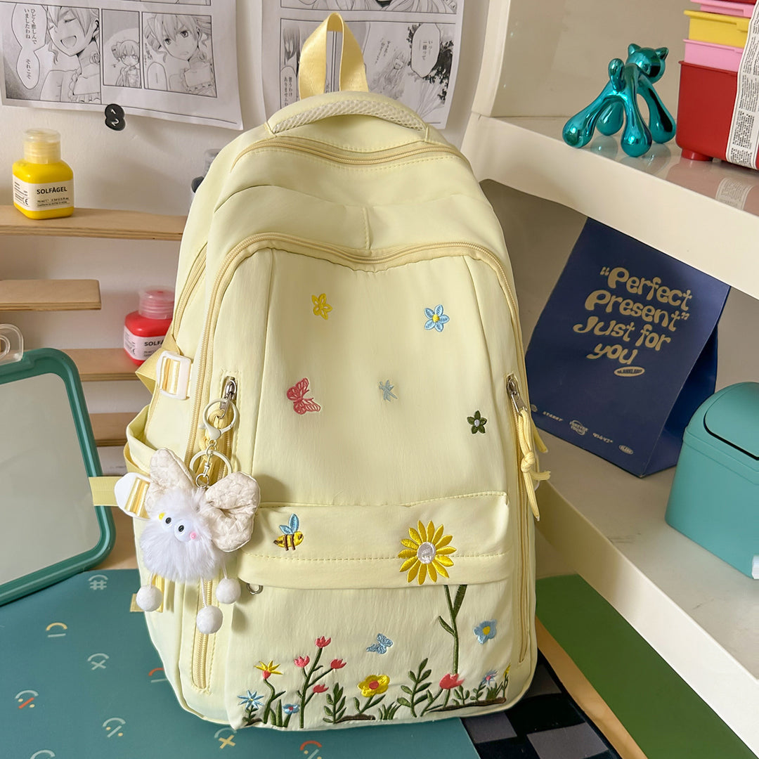 Brodert blomsterdetalj skole ryggsekk