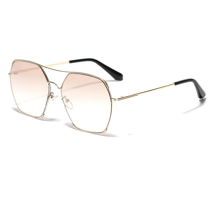 Damer oversized fashion solbriller med elegant metallramme Skanto