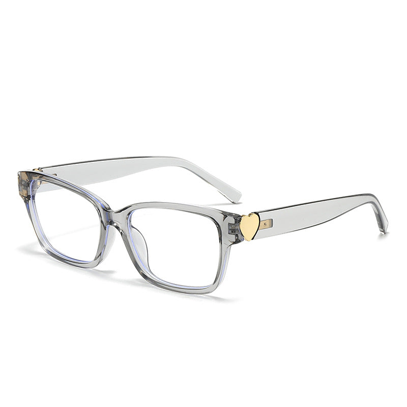 Dame moterik kvadratisk solbrille med hjerte-senter Skanto