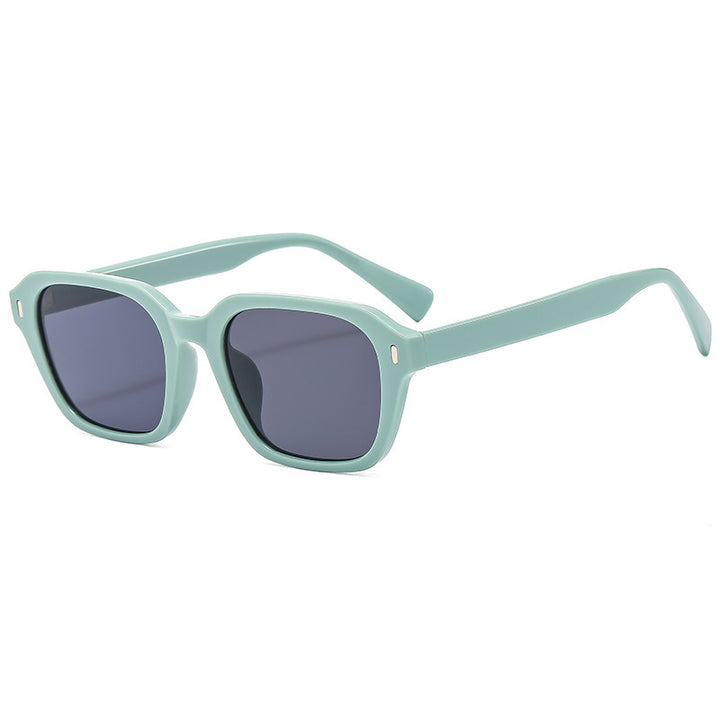 Dame Firkantet solbrille med stilfull gjennomsiktig ramme og UV-beskyttelse Skanto