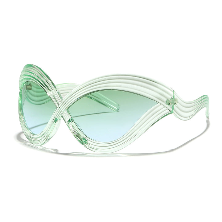 Dame moteriktig solbrille med innovativ bølkeramme Skanto