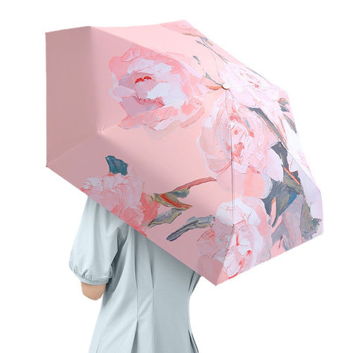Dame elegant sammenleggbart paraply med blomsterdesign og integrert drikkebeholdere Skanto