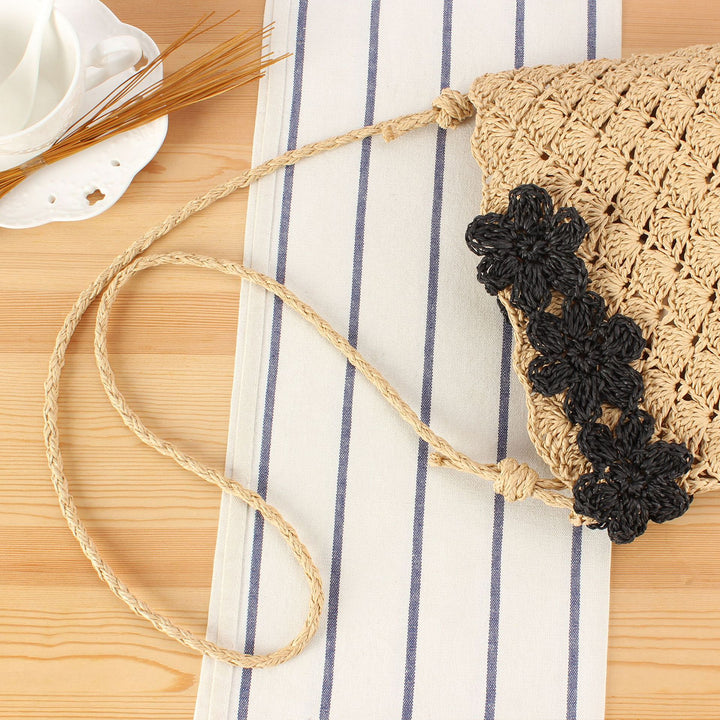 Handbag made of hand-knotted natural material with floral application Skanto