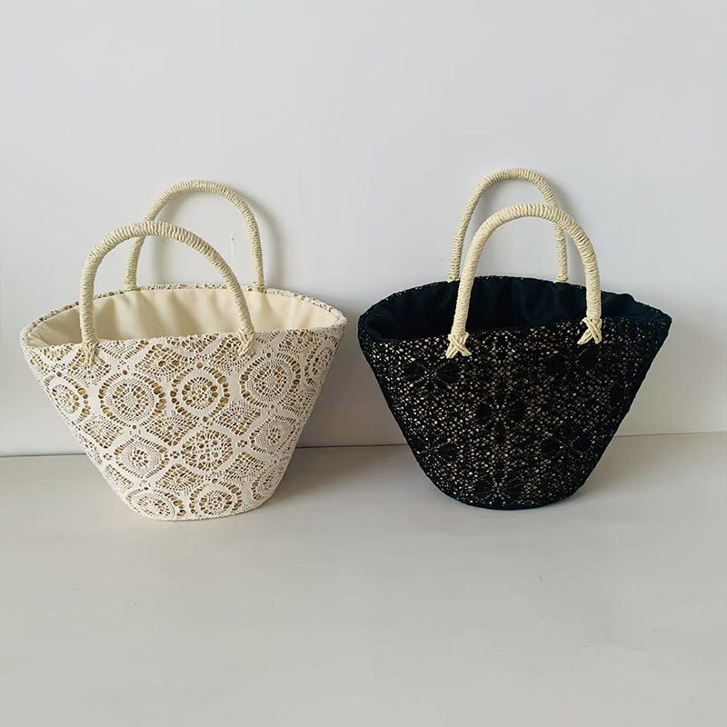 Kurvveske med elegant, flettet design Skanto