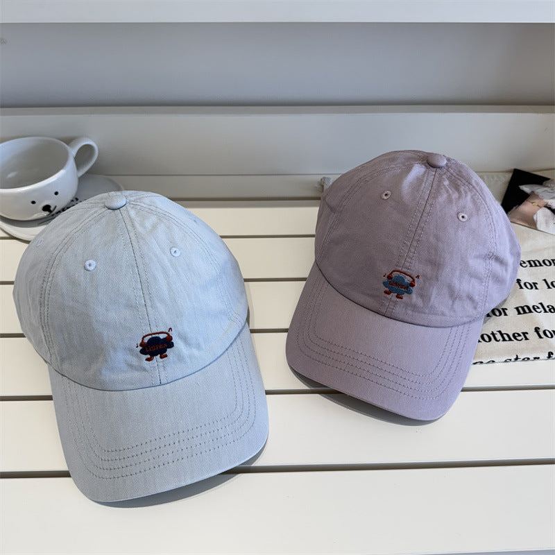 Kvinnebrodert tegneserie-tema baseball cap Skanto