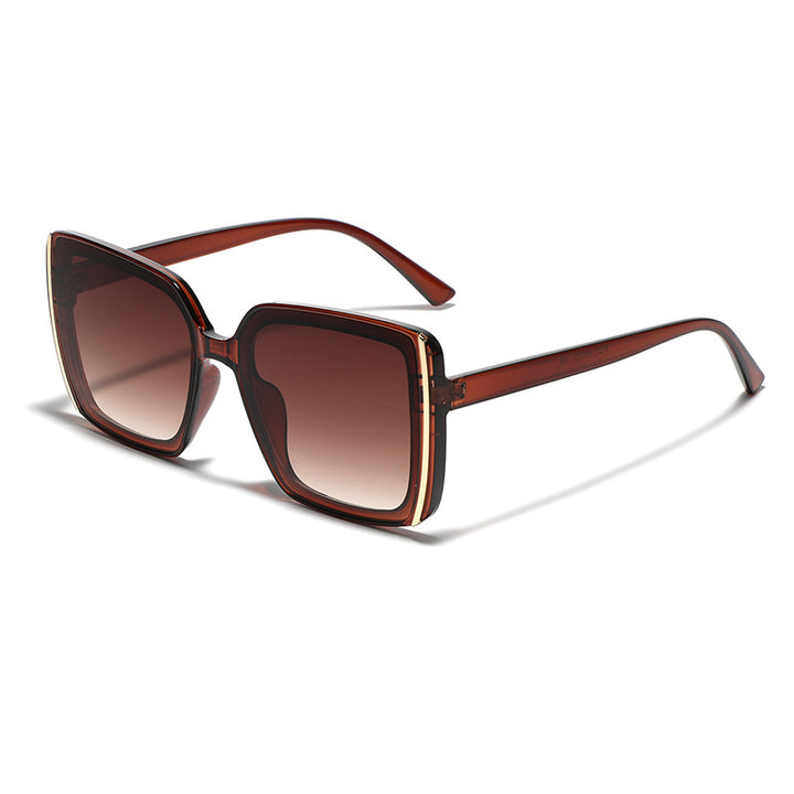 Dame oversized Designer-solbrille med unik ramme Skanto