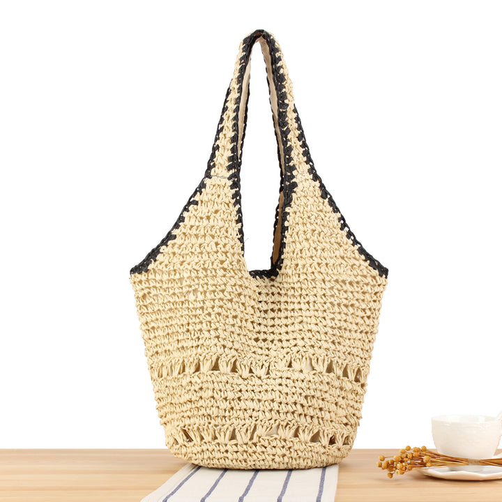 Beach shoulder bag made of hand-woven natural material with comfortable carrying handles Skanto