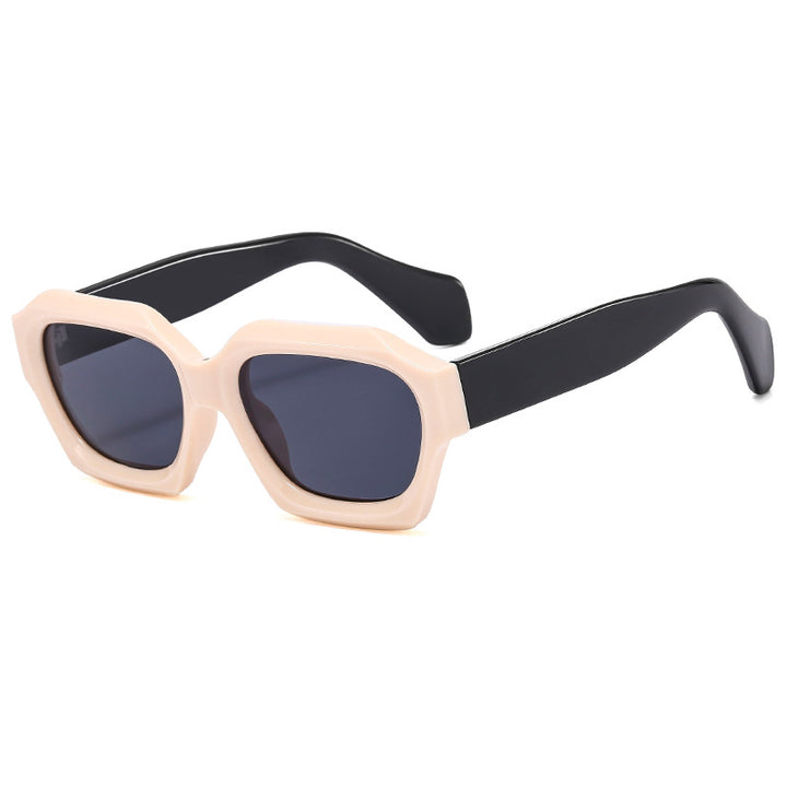 Dame designer solbrille med markant geometrisk ramme og polariserte glass Skanto