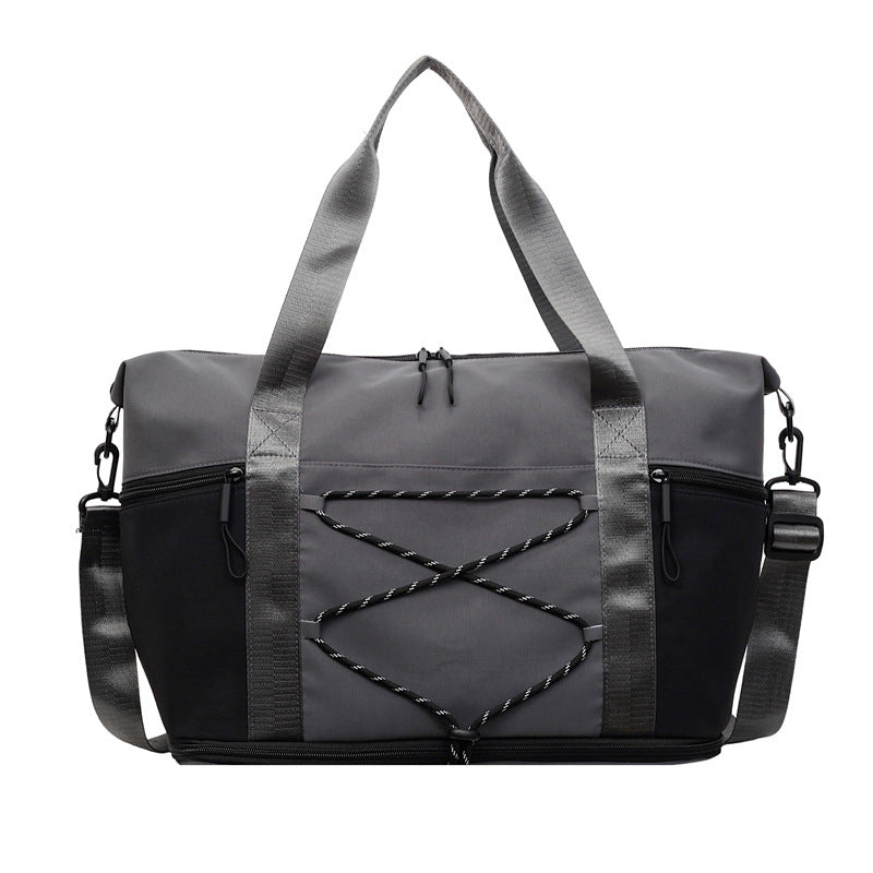 Sporty skulderveske med praktisk organizer Skanto