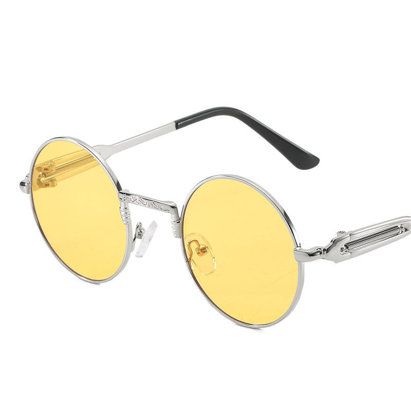 Dame rund modisk solbrille med fint metallramme Skanto