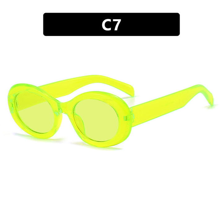 Dame moteriktig solbrille i original oval design med transparent ramme og UV-beskyttelse Skanto