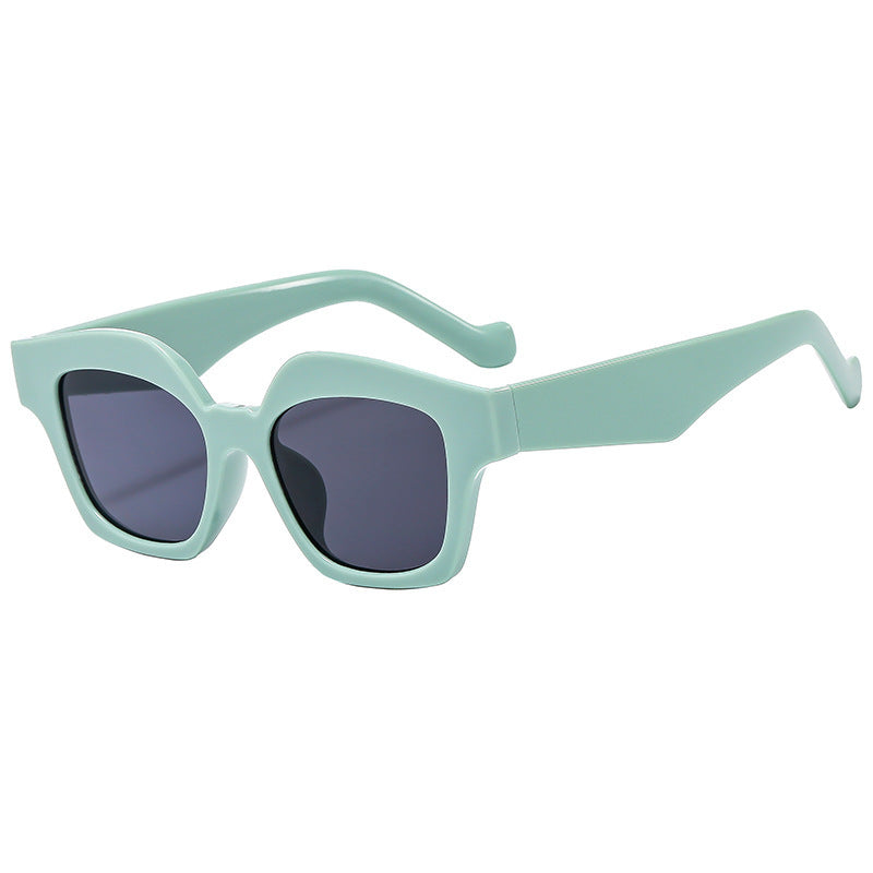 Dame designer solbrille i moderne skilpadde stil Skanto