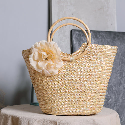 Håndveske med blomsterdetaljer Skanto