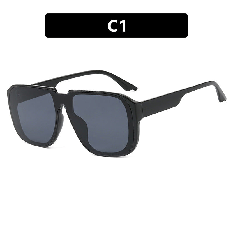 Dame trendy firkantet solbrille med gjennomsiktig, grønn ramme og beskyttende UV-filter Skanto