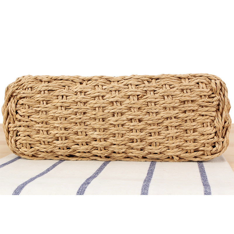 Handbag made of hand-woven natural material with bead decoration Skanto