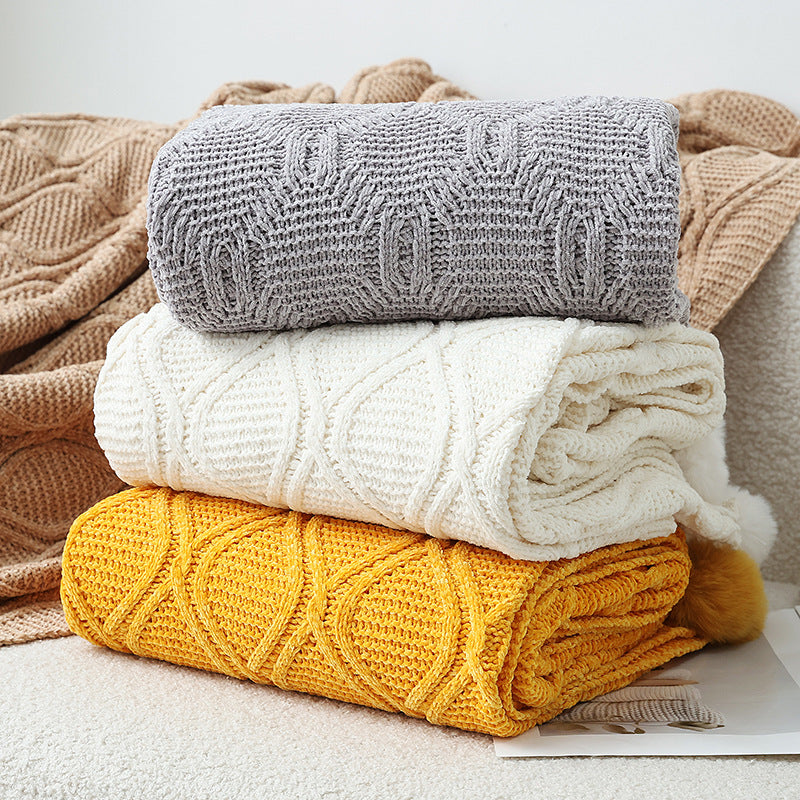 Dame strikket teppe med dekorative pom poms Skanto
