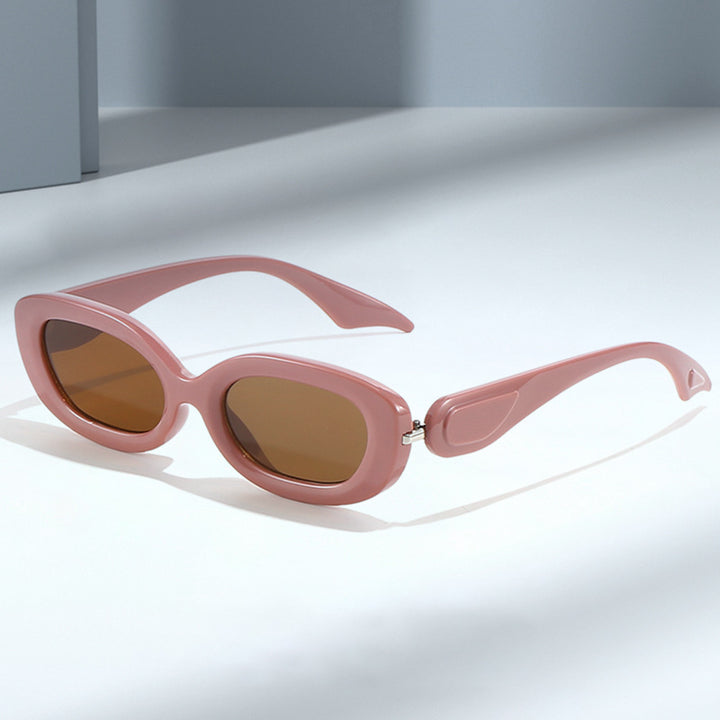 Dame moteriktig solbrille med stilfull, buet ramme Skanto