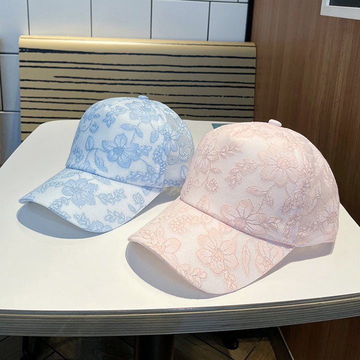 Kvinnens blomsterbroderte baseballcap Skanto