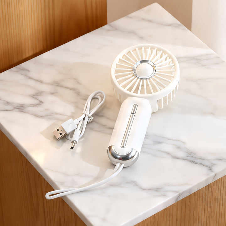 Dame bærbar mini-vifte med USB-ladefunksjon og ergonomisk design Skanto