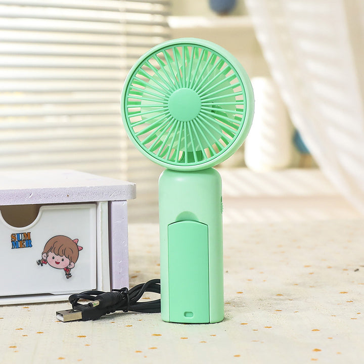 Kvinne bærbar mini håndvifte med USB-ladingsfunksjon og ergonomisk design Skanto