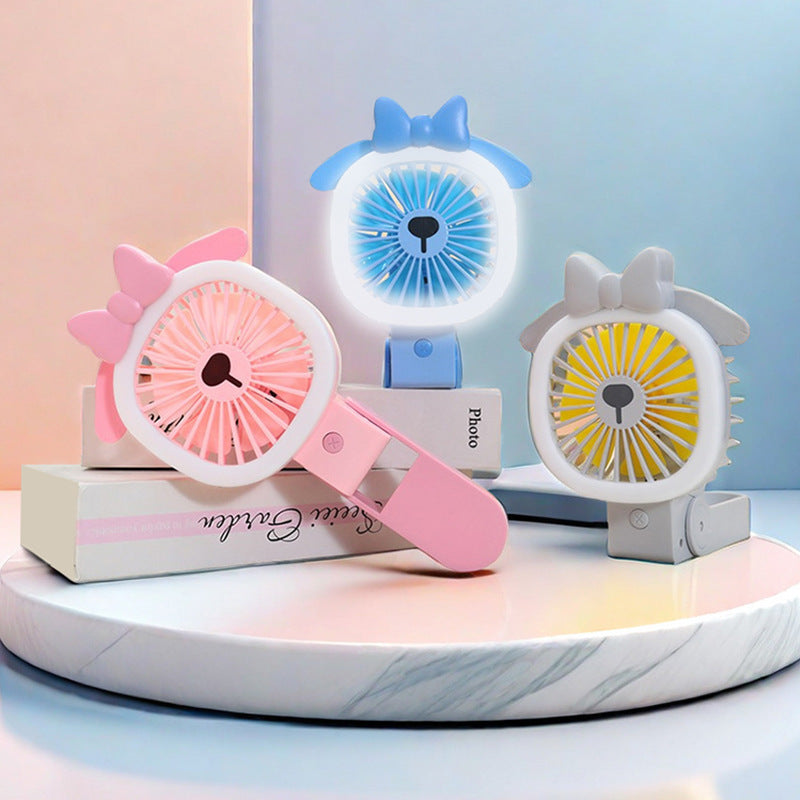 Kreativ håndvifte med USB-tilkobling og søtt design Skanto