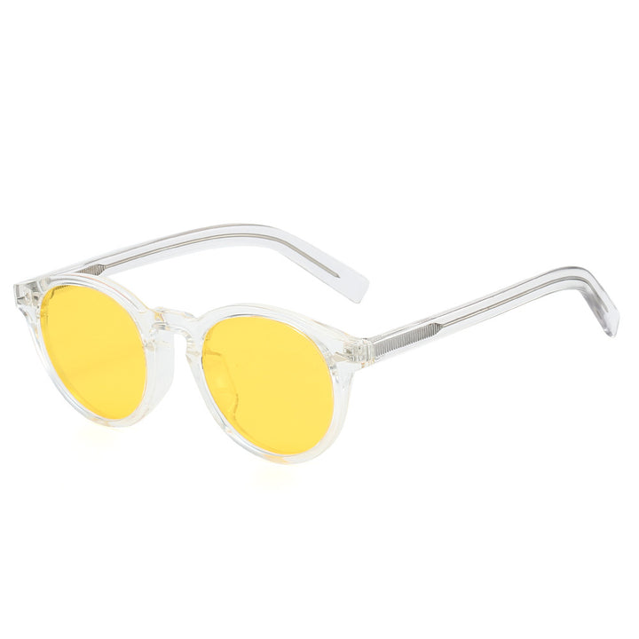 Dame trendy solbriller med transparent ramme og gule glass Skanto