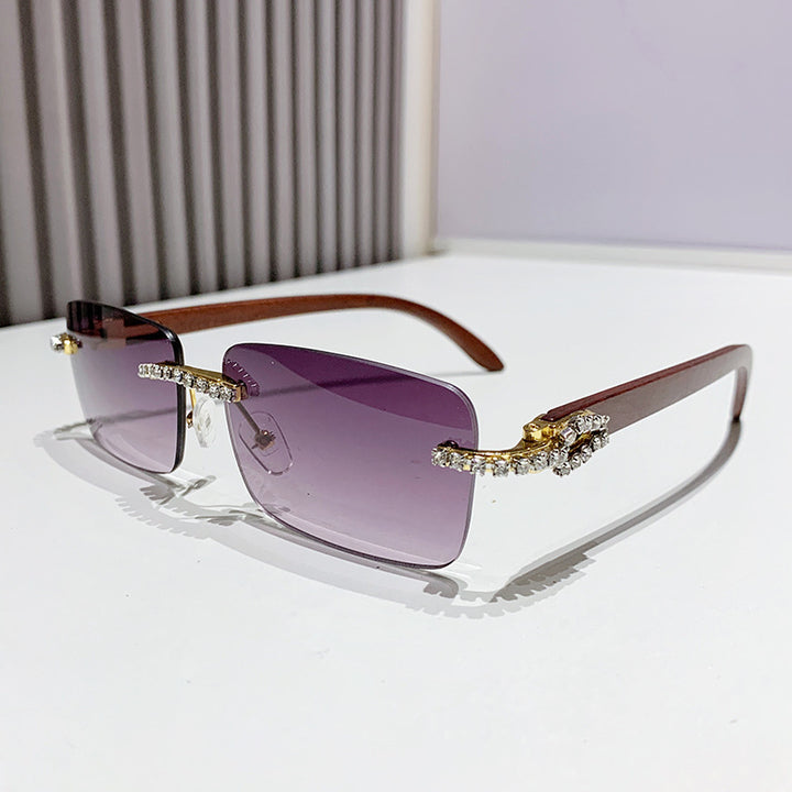 Dame elegant solbrille med unik ramme Skanto