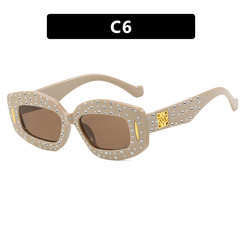 Dame moteriktig solbrille med glamorøs strass-dekor Skanto