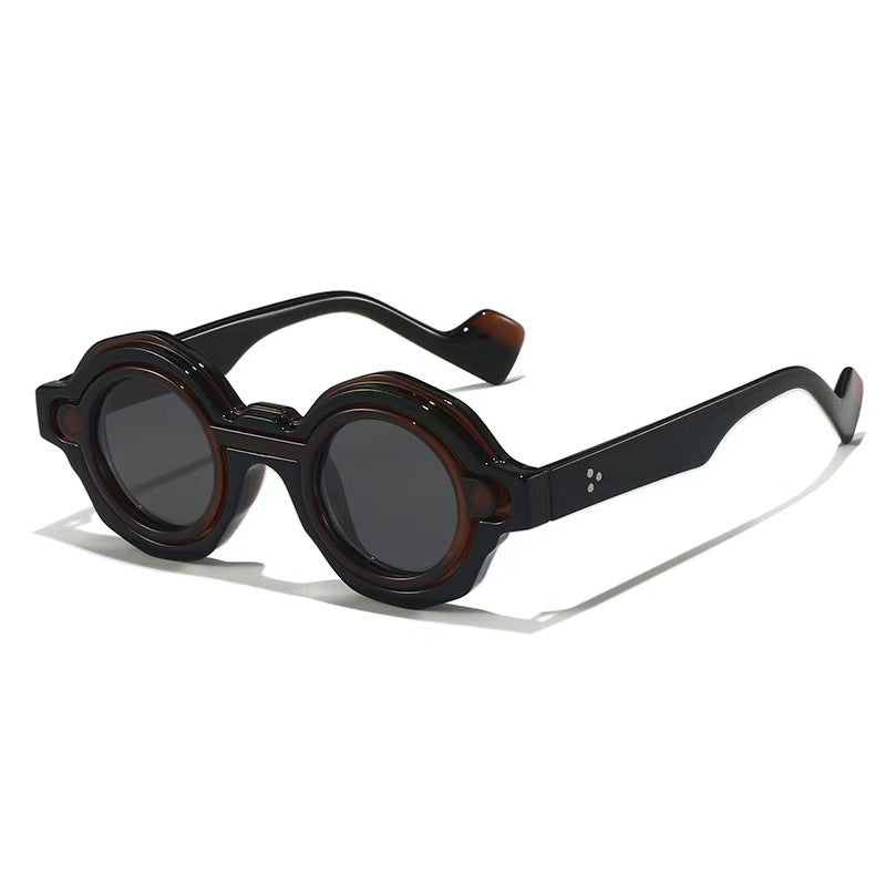 Damer moterik solbrille med unikt runddesign Skanto