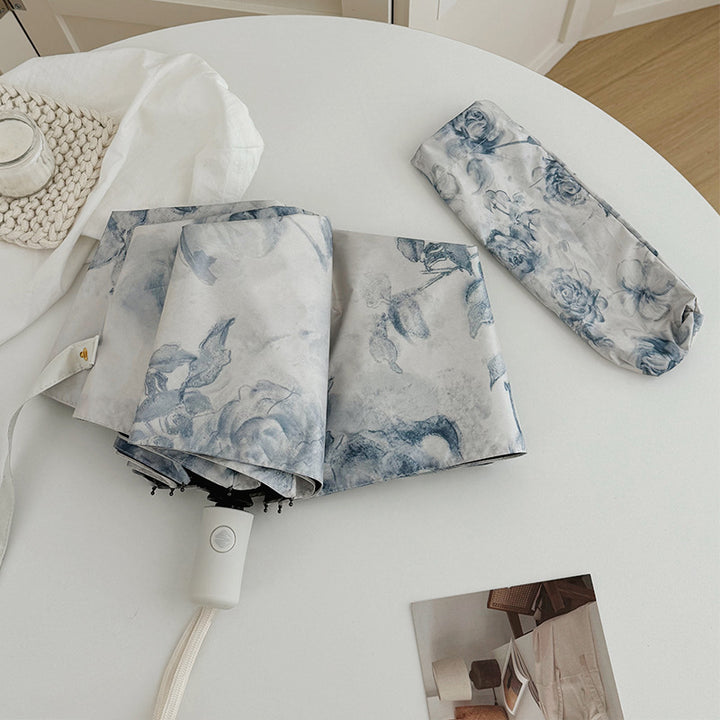 Dame sammenleggbar paraply med romantisk blomsterdesign Skanto