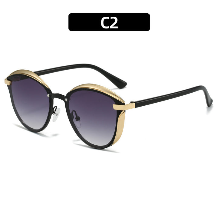 Dame solbrille med luksuriøs metallramme og harmonisk kontur Skanto