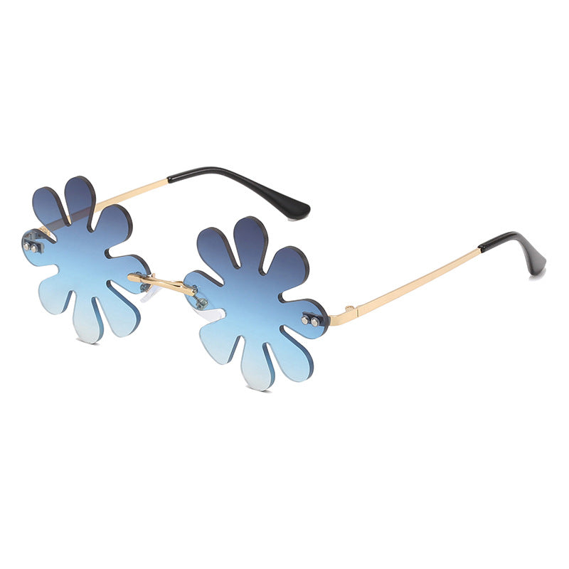 Dame Lekker blomster-solkors med stilfull metallramme Skanto