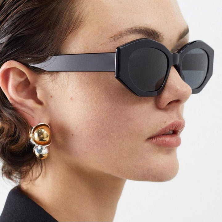 Dame geometrisk solbrille med trendy, gjennomsiktig ramme Skanto