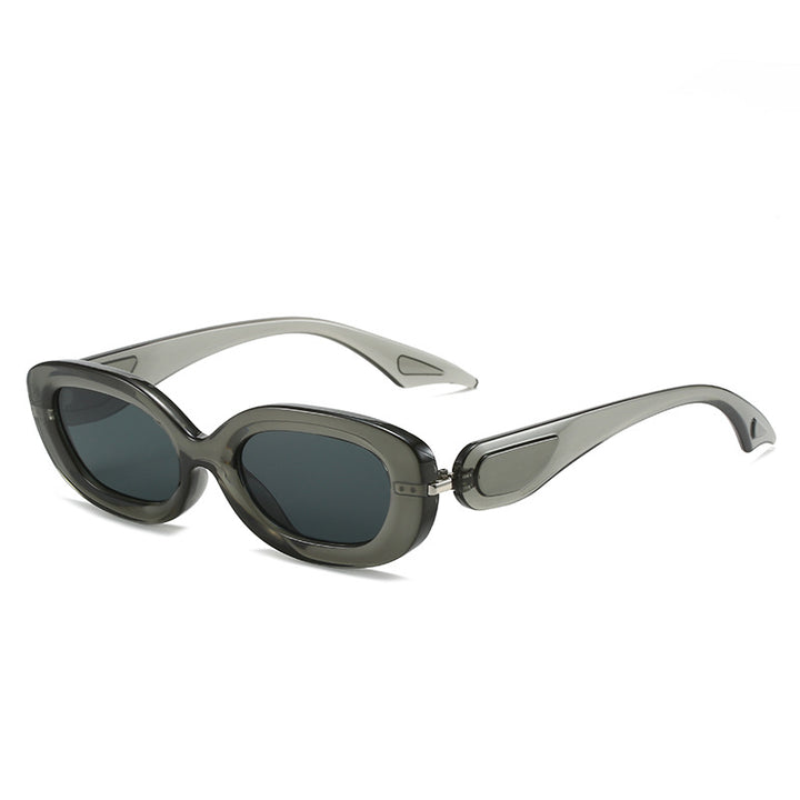 Dame moteriktig solbrille med stilfull, buet ramme Skanto