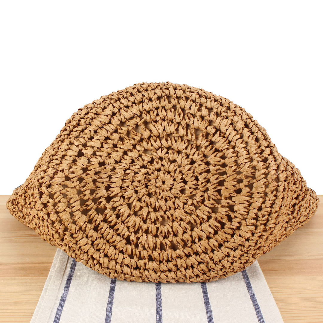 Beach shoulder bag made of hand-woven natural material with comfortable carrying handles Skanto