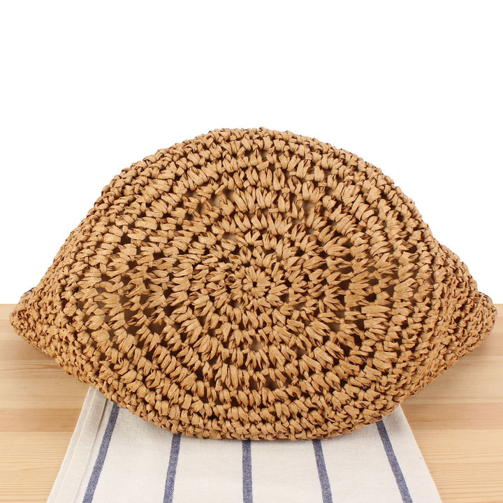 Beach shoulder bag made of hand-woven natural material with comfortable carrying handles Skanto
