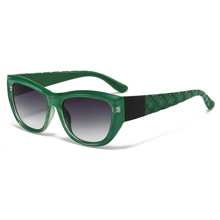 Dame Cat-Eye solbrille med elegant, transparent ramme Skanto