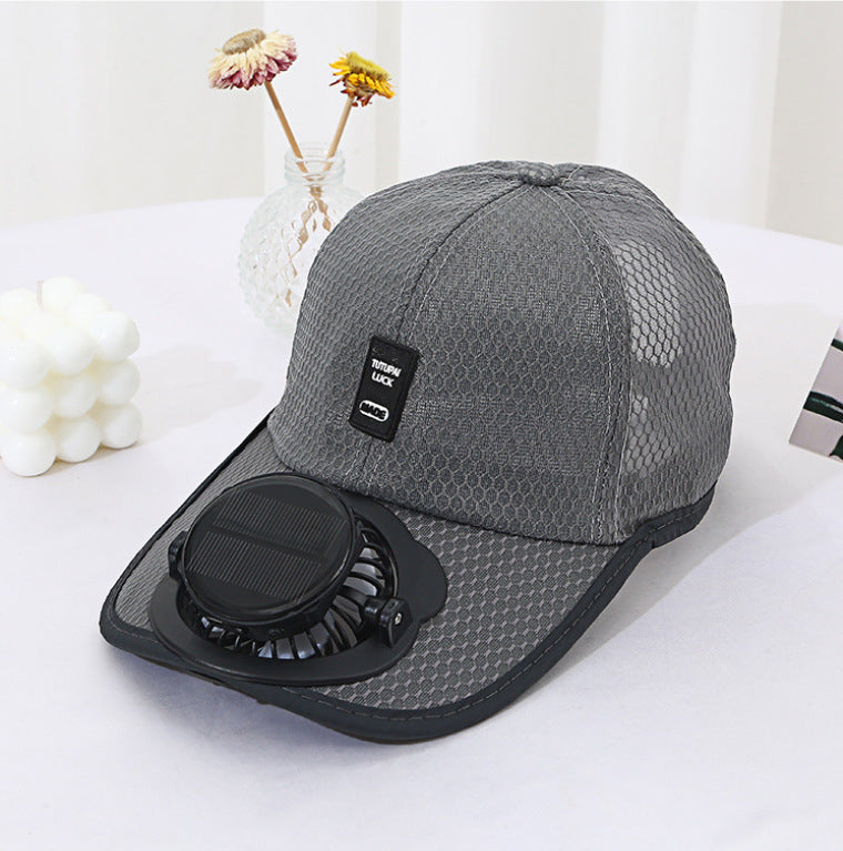 Ventilert baseball cap med integrert solfan i visiret og pustende nett Skanto