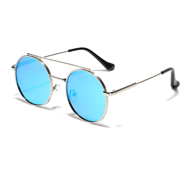Dame rund solbrille med moteramme Skanto