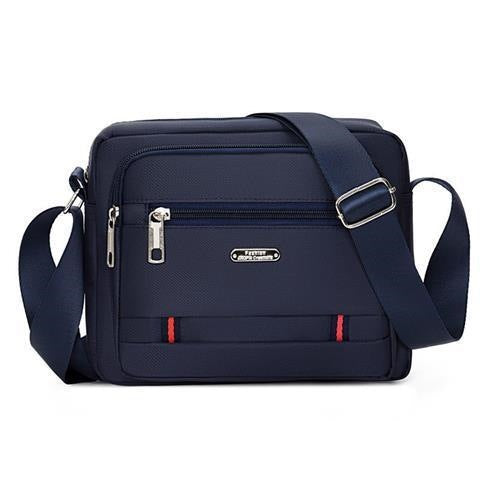 Praktisk crossbody-veske med multifunksjonelt fagssystem Skanto