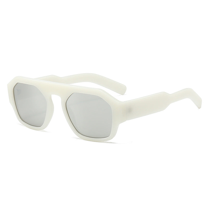 Dame motetrender solbrille i innovativ geometrisk design Skanto