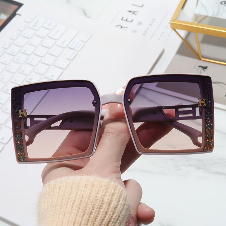 Dame trendy solbrille med ekstravagant, rektangulær ramme Skanto
