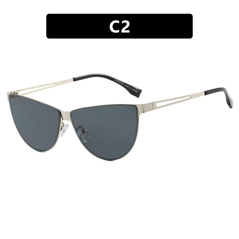 Dame Cat-Eye solbriller med stilfull metallramme og beskyttende UV-filter Skanto