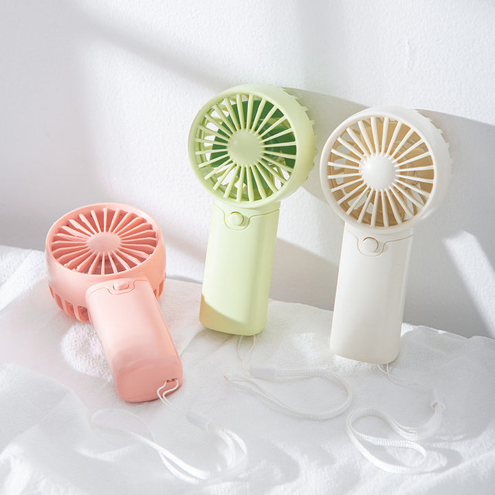 Kvinnenes bærbare mini håndholdte vifte med innovativ luftbevegelse Skanto