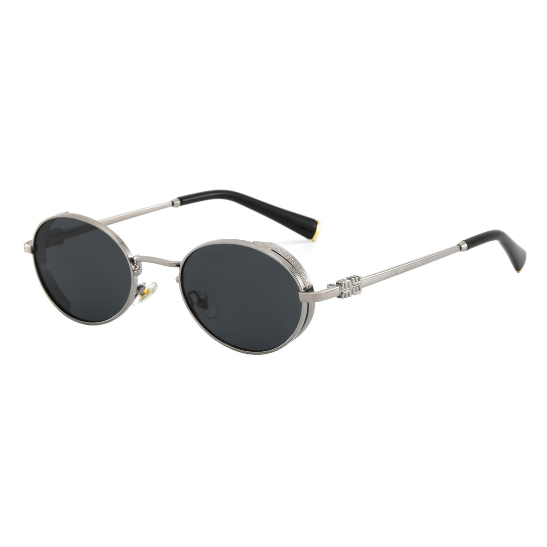 Dame Runde Designer-solbrille med elegant metallramme Skanto