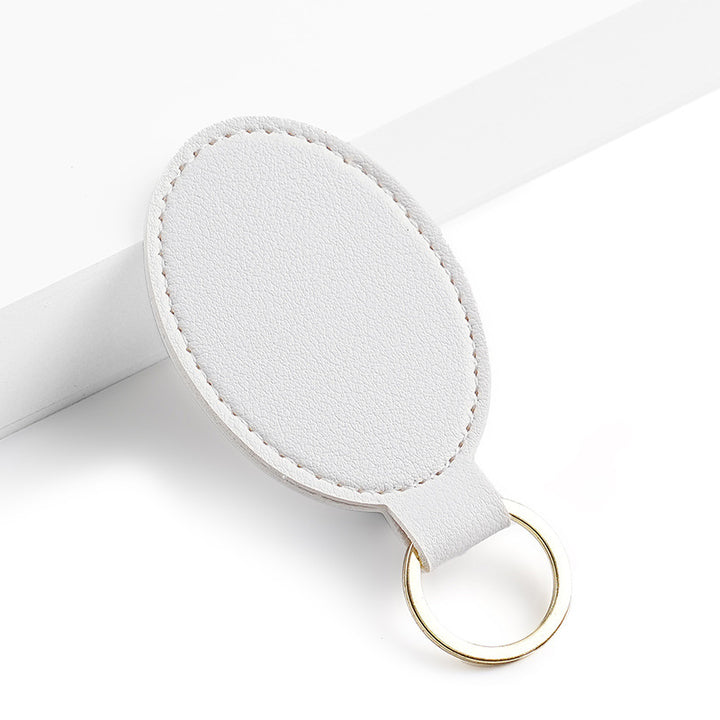 Unisex nøkkelring i høy kvalitet av kunstskinn med stiløs design Skanto